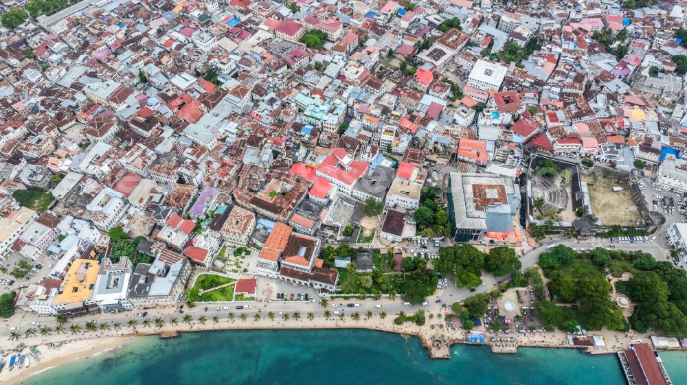 Aerial photograph Zanzibar - City view on sea coastline Stone Town in ZansZbar in Unguja Mjini Magharibi, Tanzania