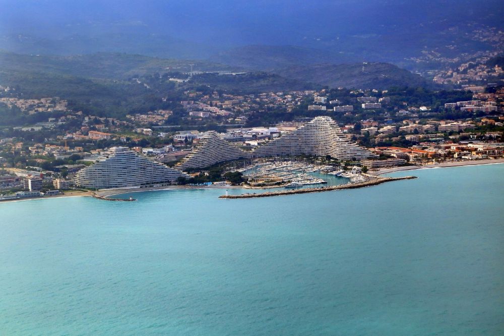 Aerial image Villeneuve-Loubet - Panorama cityscape on the seacoast of the Mediterranean Sea with Marina Baie des Anges in Villeneuve-Loubet in Provence-Alpes-Cote d'Azur, France