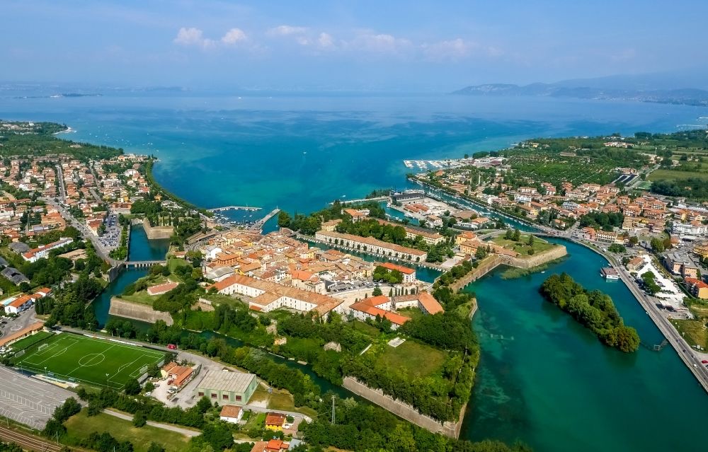 Peschiera del Garda from above - City view of Peschiera del Garda in the province Verona in Italy. The City is locaded at the southern bank of the Gardasee. Also the Mincio river flows into the Gardasee