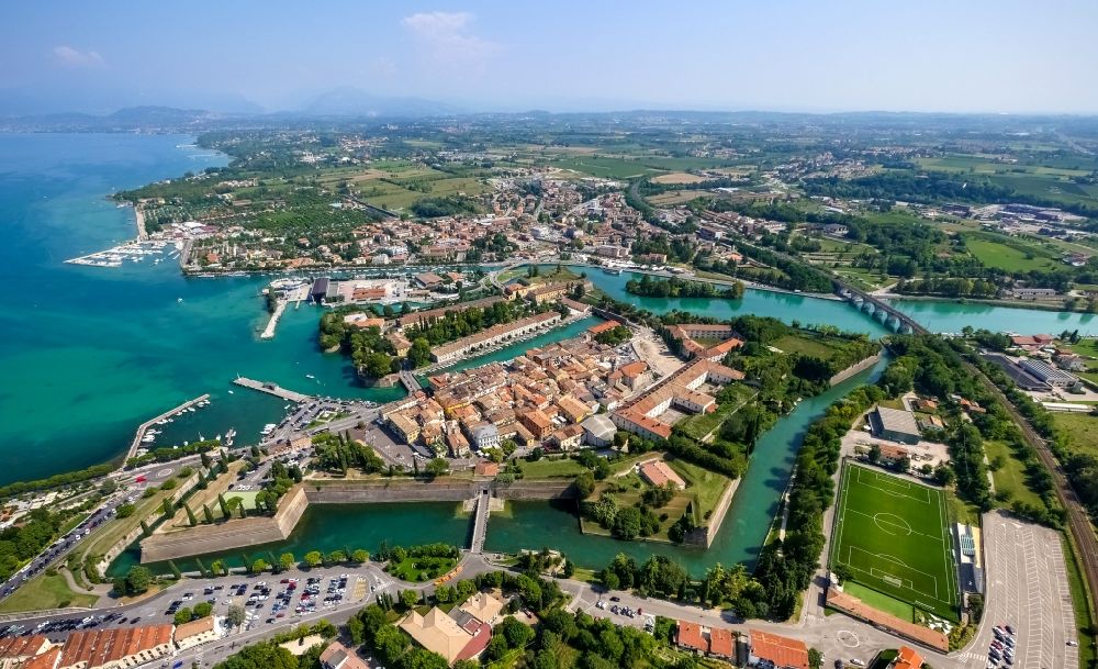 Aerial photograph Peschiera del Garda - City view of Peschiera del Garda in the province Verona in Italy. The City is locaded at the southern bank of the Gardasee. Also the Mincio river flows into the Gardasee
