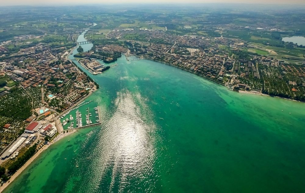 Aerial image Peschiera del Garda - City view of Peschiera del Garda in the province Verona in Italy. The City is locaded at the southern bank of the Gardasee. Also the Mincio river flows into the Gardasee
