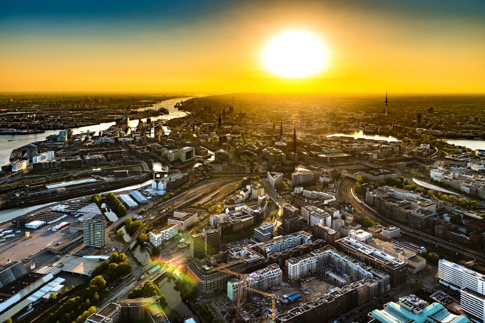 Hamburg from the bird's eye view: City view on the river bank of the River Elbe, by sunset, in the district HafenCity in Hamburg, Germany