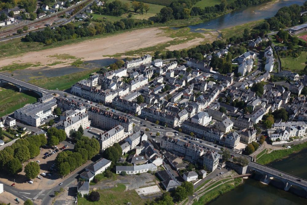 Saumur from the bird's eye view: City view on the river bank of the Loire in Saumur in Pays de la Loire, France, A part of the town is located on the island of Ile d' Offard in the Loire
