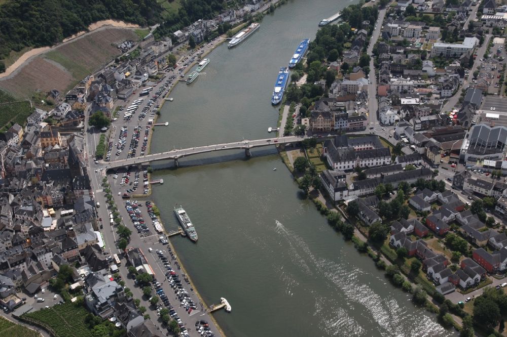 Aerial image Bernkastel-Kues - City view on the river bank of the river Mosel in Bernkastel-Kues in the state Rhineland-Palatinate, Germany. Over the Mosel leads a road bridge