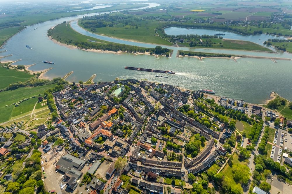 Rees from above - City view on the river bank of the Rhine river in Rees in the state North Rhine-Westphalia, Germany