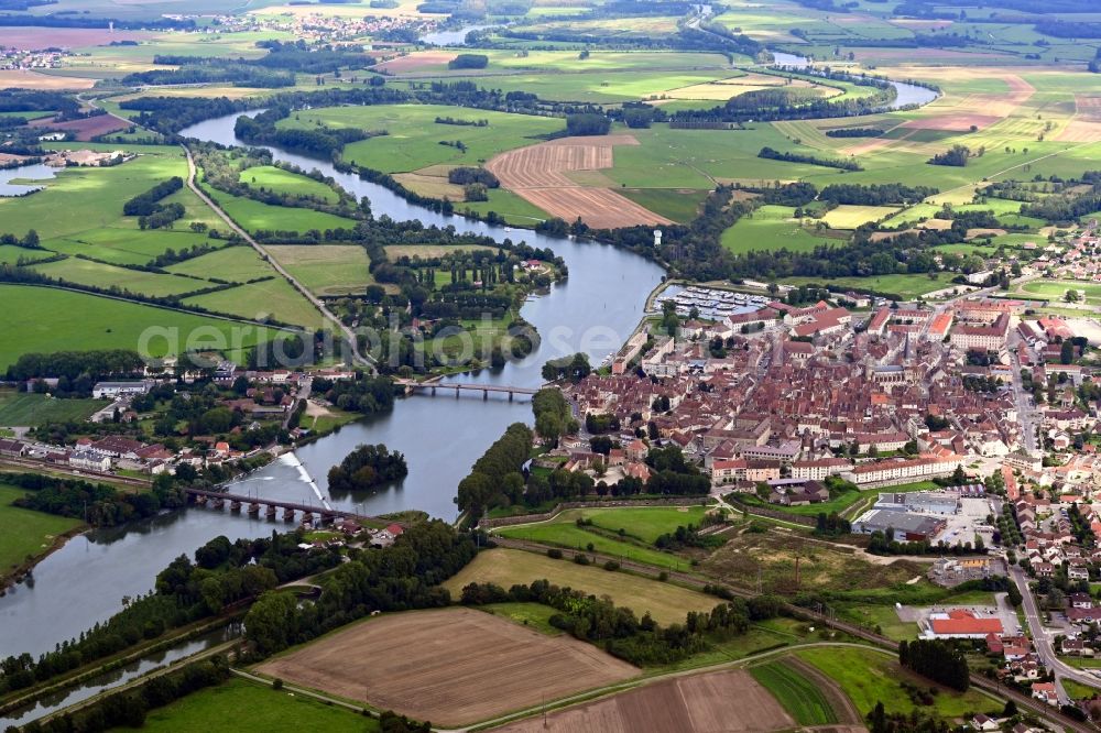 Auxonne from the bird's eye view: City view on the Saone river bank of in Auxonne in Bourgogne-Franche-Comte, France