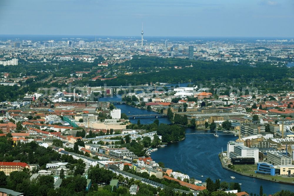 Berlin from the bird's eye view: City view Oberschoeneweide and Niederschoeneweide on the river bank of Spree River in the district Schoeneweide in Berlin, Germany