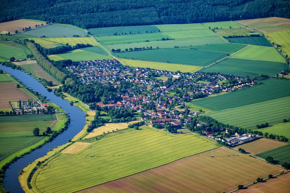 Grohnde from above - City view on the river bank of the Weser river in Grohnde in the state Lower Saxony, Germany