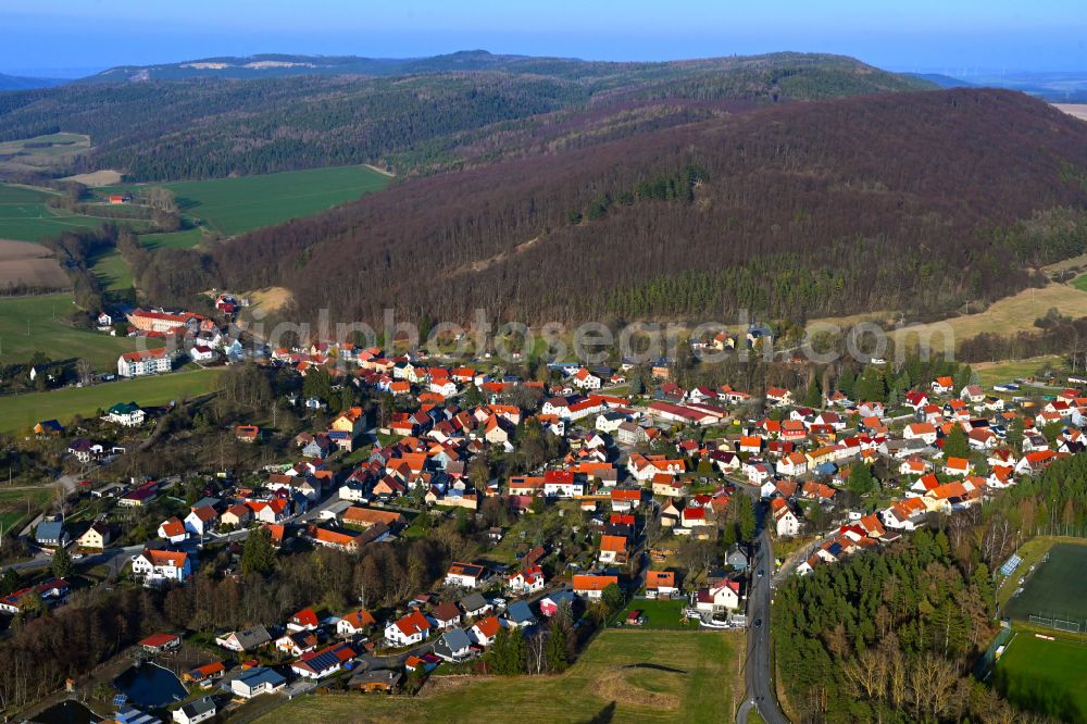 Martinroda from above - City view of the inner city area in the valley surrounded by mountains in Martinroda in the state Thuringia, Germany