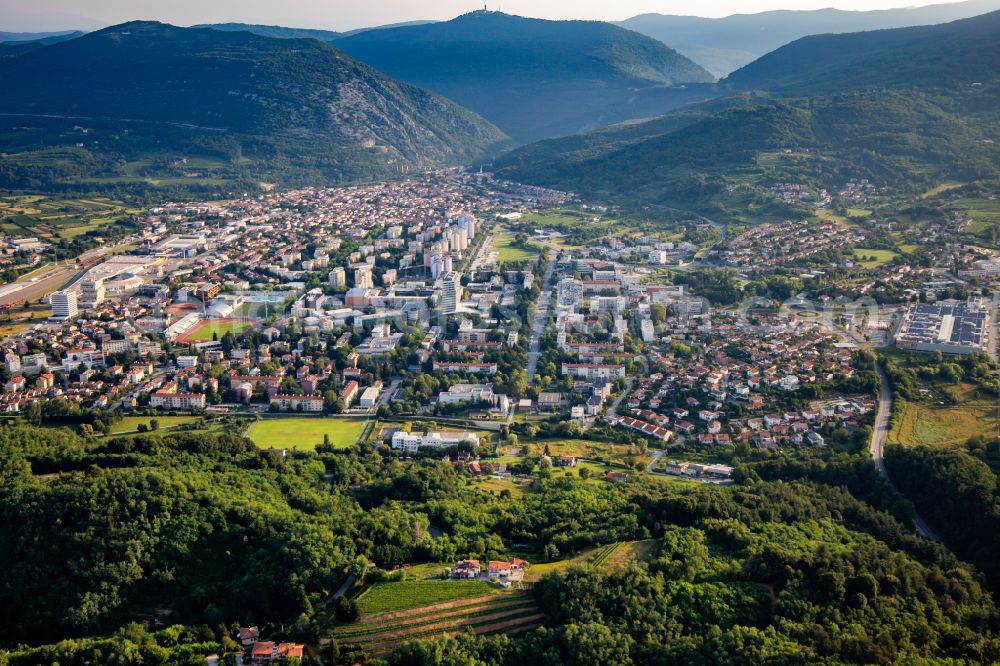 Nova Gorica from above - City view of the inner city area in the valley surrounded by mountains in Nova Gorica in Slovenia