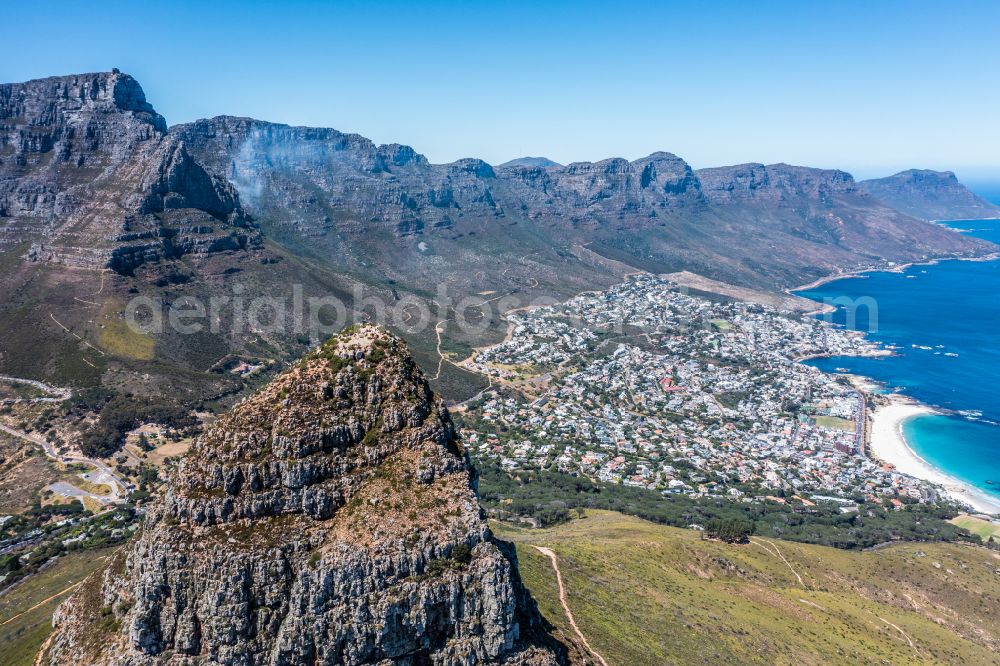 Kapstadt from above - City view of the inner city area in the valley surrounded by mountains Table Mountain, twelve apostle and Lion'sHead in the district Camps Bay in Cape Town in Western Cape, South Africa