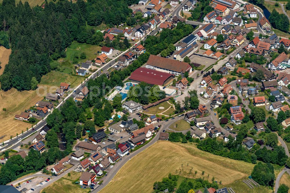 Baiersbronn from the bird's eye view: City view of the inner city area in the valley surrounded by mountains of Murgtal in Baiersbronn at Schwarzwald in the state Baden-Wuerttemberg, Germany