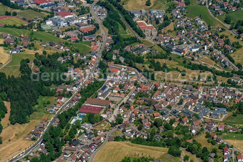 Baiersbronn from above - City view of the inner city area in the valley surrounded by mountains of Murgtal in Baiersbronn at Schwarzwald in the state Baden-Wuerttemberg, Germany