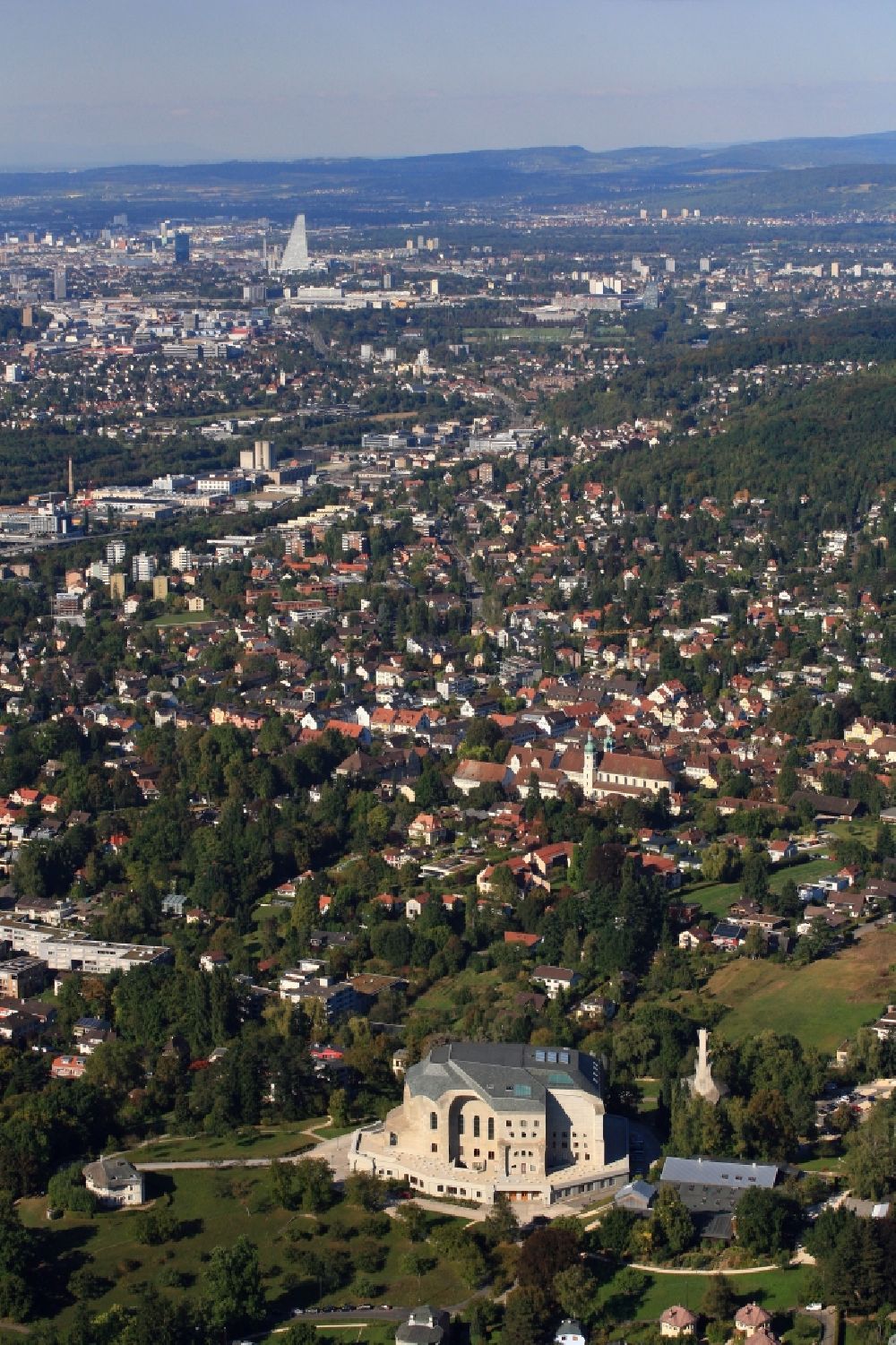 Aerial image Dornach - The Goetheanum in Dornach, Switzerland in the canton of Solothurn is the headquarters of the Anthroposophical Society and the School of Spiritual Science. Looking northbound towards Basle