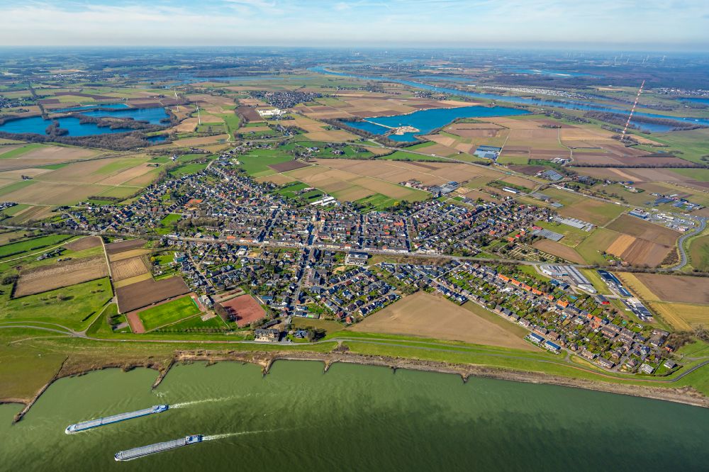 Aerial photograph Büderich - Urban area with outskirts and inner city area on the edge of agricultural fields and arable land in Buederich at Ruhrgebiet in the state North Rhine-Westphalia, Germany