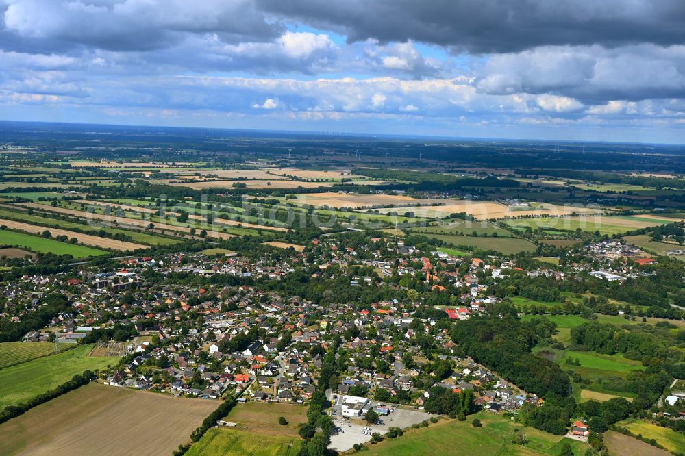 Aerial image Bornhöved - Urban area with outskirts and inner city area on the edge of agricultural fields and arable land in Bornhoeved in the state Schleswig-Holstein, Germany