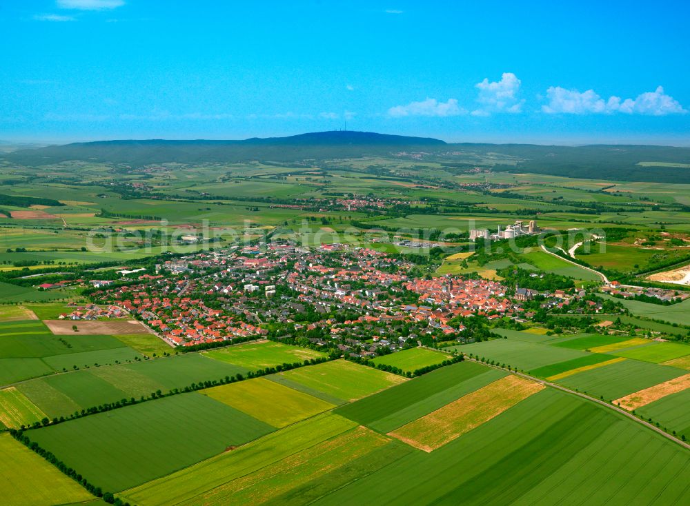 Göllheim from the bird's eye view: Urban area with outskirts and inner city area on the edge of agricultural fields and arable land in Göllheim in the state Rhineland-Palatinate, Germany