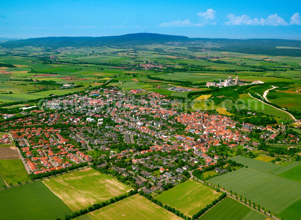 Aerial image Göllheim - Urban area with outskirts and inner city area on the edge of agricultural fields and arable land in Göllheim in the state Rhineland-Palatinate, Germany