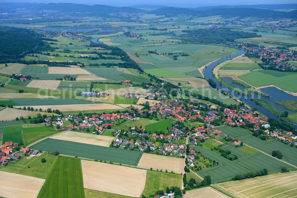Aerial photograph Hessisch Oldendorf - Urban area with outskirts and inner city area on the edge of agricultural fields and arable land in Hessisch Oldendorf in the state Lower Saxony, Germany