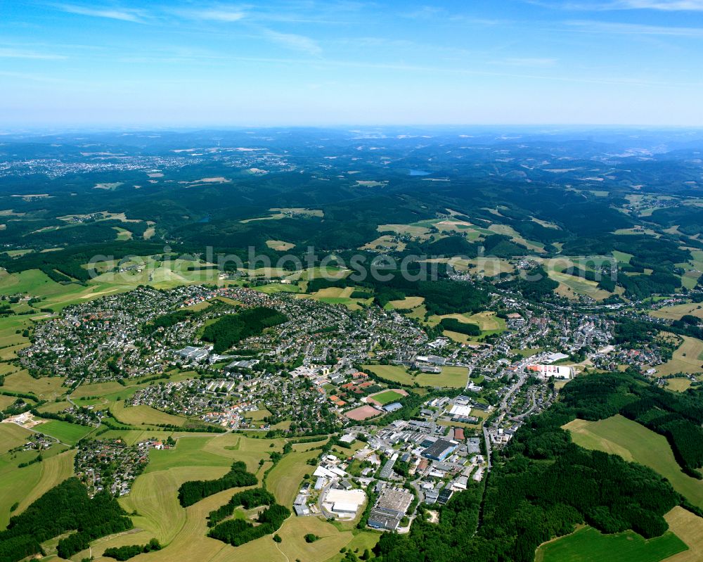 Aerial image Kierspe - Urban area with outskirts and inner city area on the edge of agricultural fields and arable land in Kierspe in the state North Rhine-Westphalia, Germany