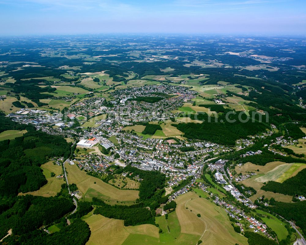 Aerial photograph Kierspe - Urban area with outskirts and inner city area on the edge of agricultural fields and arable land in Kierspe in the state North Rhine-Westphalia, Germany