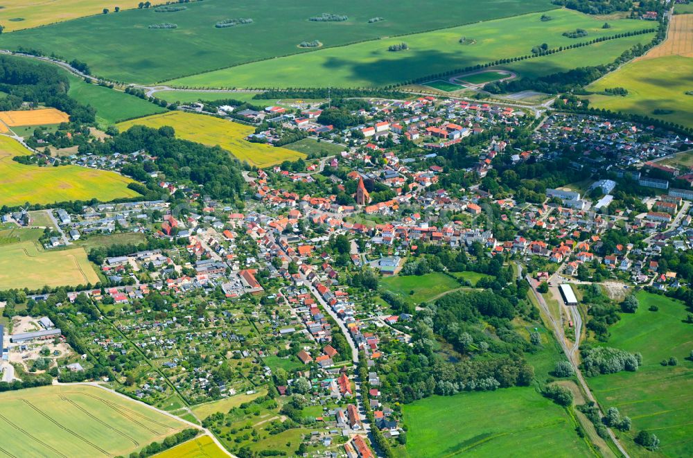 Aerial photograph Niederklütz - Urban area with outskirts and inner city area on the edge of agricultural fields and arable land in Niederklütz in the state Mecklenburg - Western Pomerania, Germany