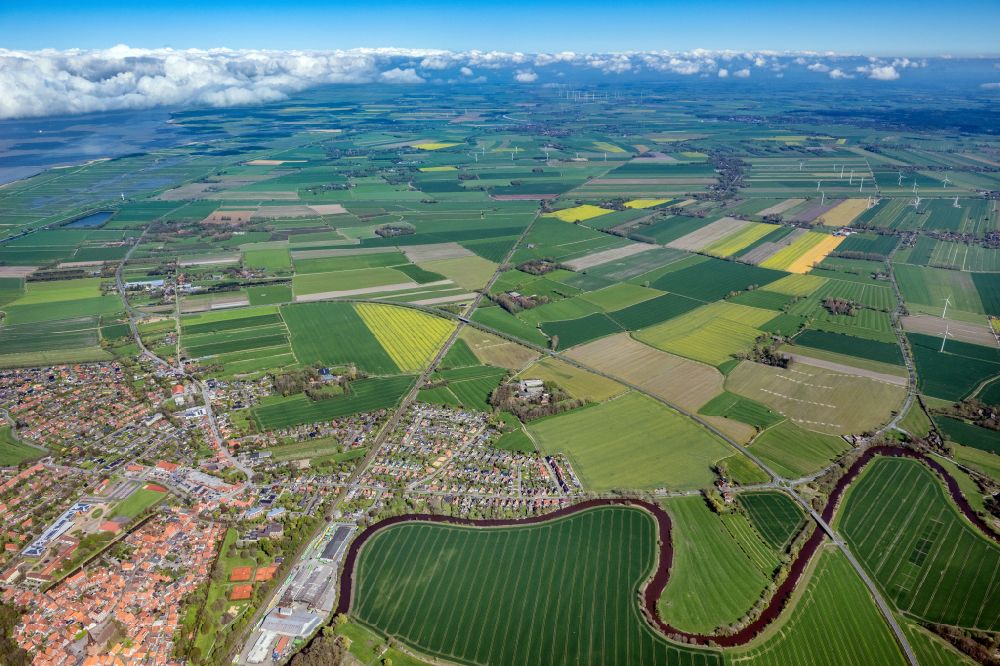 Aerial photograph Otterndorf - Urban area with outskirts and inner city area on the edge of agricultural fields and arable land in Otterndorf in the state Lower Saxony, Germany