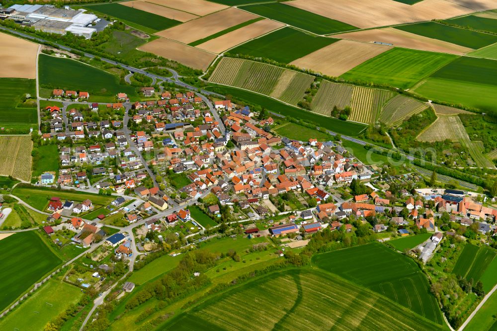 Repperndorf from the bird's eye view: Urban area with outskirts and inner city area on the edge of agricultural fields and arable land in Repperndorf in the state Bavaria, Germany
