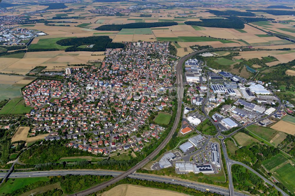 Rottendorf from above - Urban area with outskirts and inner city area on the edge of agricultural fields and arable land in Rottendorf in the state Bavaria, Germany