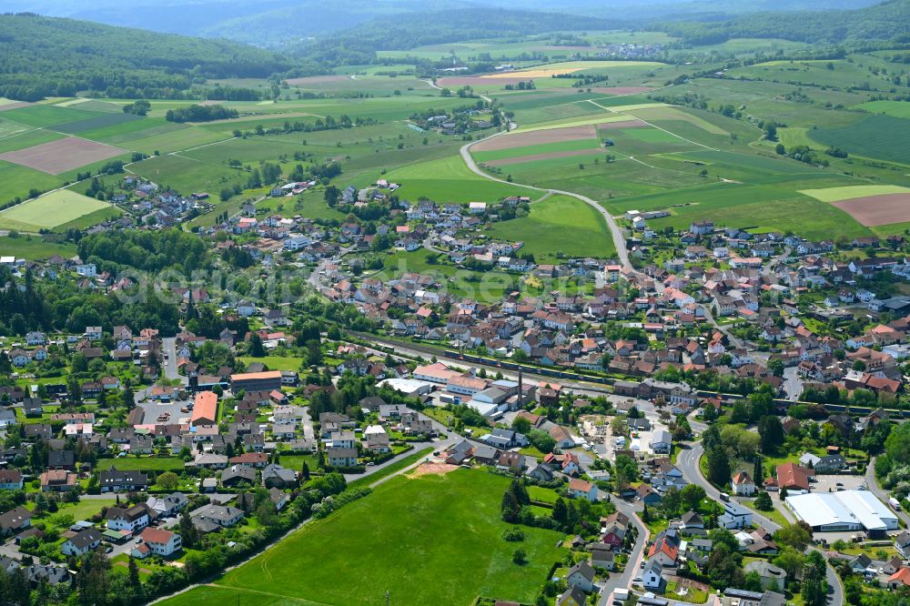 Sterbfritz from above - Urban area with outskirts and inner city area on the edge of agricultural fields and arable land in Sterbfritz in the state Hesse, Germany