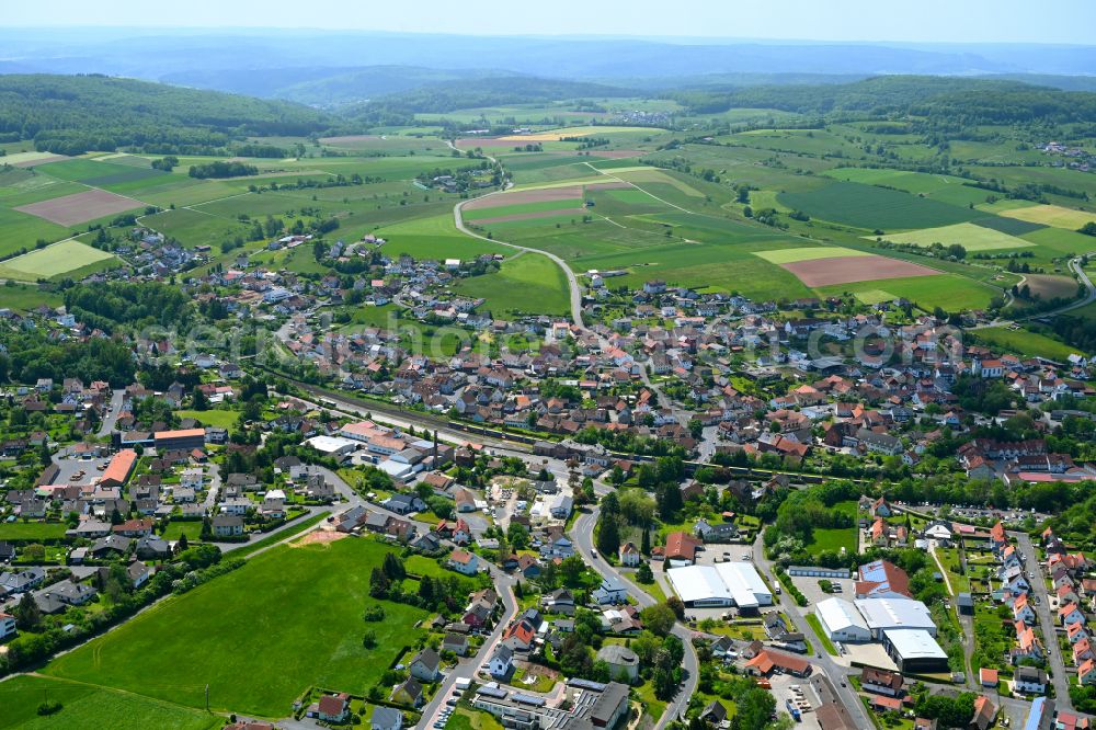 Sterbfritz from the bird's eye view: Urban area with outskirts and inner city area on the edge of agricultural fields and arable land in Sterbfritz in the state Hesse, Germany