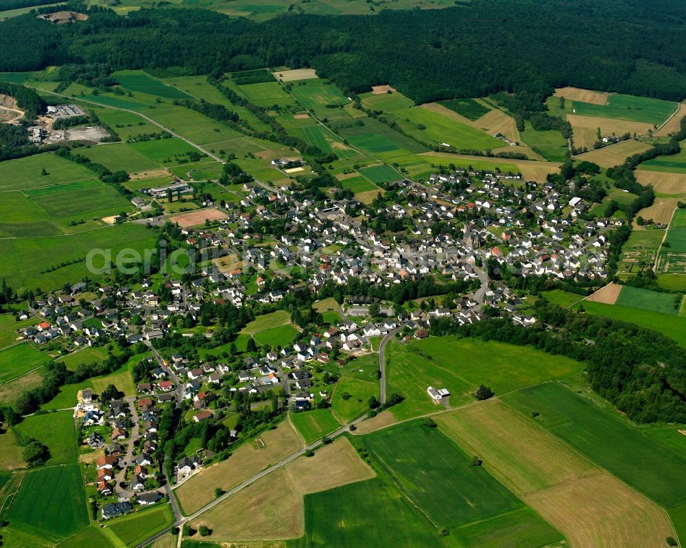 Aerial image Thalheim - Urban area with outskirts and inner city area on the edge of agricultural fields and arable land in Thalheim in the state Hesse, Germany