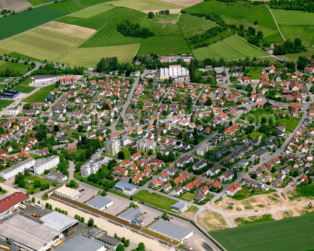 Aerial image Ummendorf - Urban area with outskirts and inner city area on the edge of agricultural fields and arable land in Ummendorf in the state Baden-Wuerttemberg, Germany