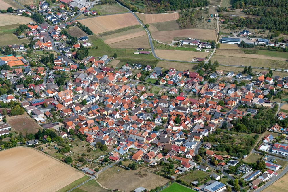 Wiesenfeld from above - Urban area with outskirts and inner city area on the edge of agricultural fields and arable land in Wiesenfeld in the state Bavaria, Germany