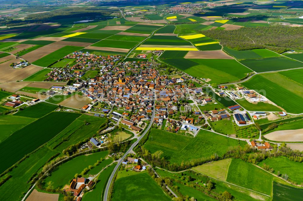 Aerial image Willanzheim - Urban area with outskirts and inner city area on the edge of agricultural fields and arable land in Willanzheim in the state Bavaria, Germany