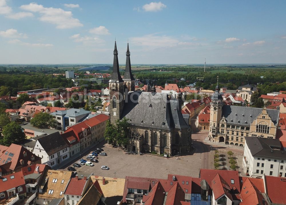Aerial photograph Köthen (Anhalt) - Church of Saint Jakob and town hall of Koethen (Anhalt) in the state of Saxony-Anhalt. A tower and parts of the town hall are scaffolded and being renovated