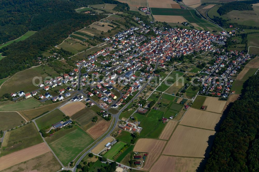 Greußenheim from the bird's eye view: City view from the outskirts with adjacent agricultural fields in Greußenheim in the state Bavaria, Germany