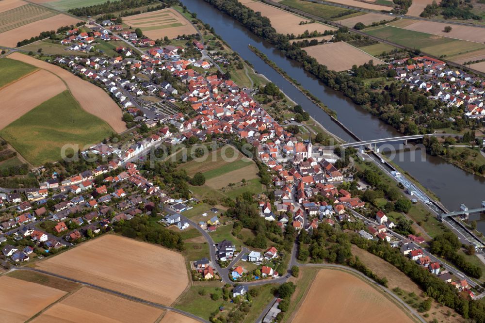 Himmelstadt from the bird's eye view: City view from the outskirts with adjacent agricultural fields in Himmelstadt in the state Bavaria, Germany