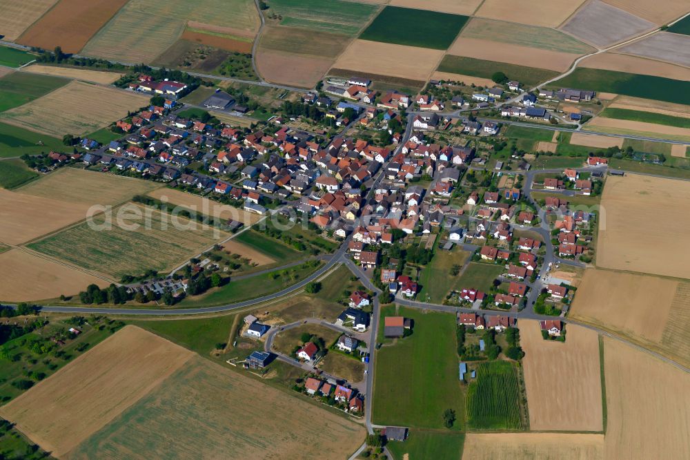 Holzkirchhausen from above - City view from the outskirts with adjacent agricultural fields in Holzkirchhausen in the state Bavaria, Germany