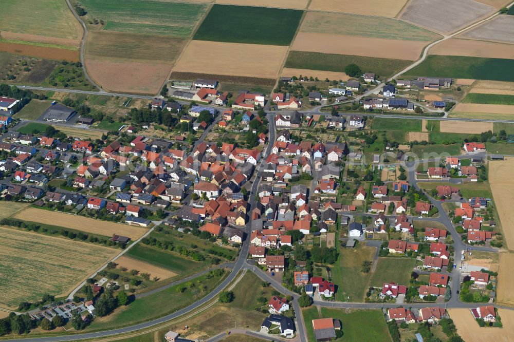 Holzkirchhausen from the bird's eye view: City view from the outskirts with adjacent agricultural fields in Holzkirchhausen in the state Bavaria, Germany
