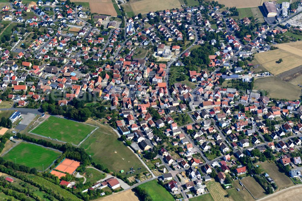 Aerial image Kleinrinderfeld - City view from the outskirts with adjacent agricultural fields in Kleinrinderfeld in the state Bavaria, Germany