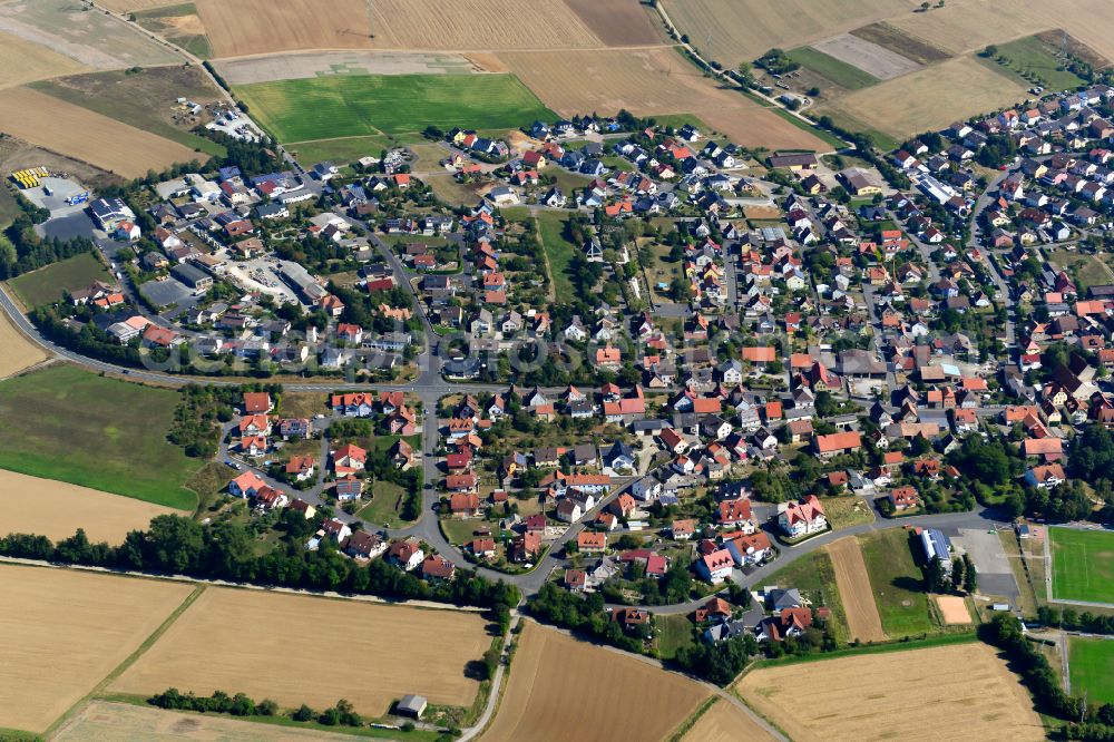 Aerial photograph Kleinrinderfeld - City view from the outskirts with adjacent agricultural fields in Kleinrinderfeld in the state Bavaria, Germany