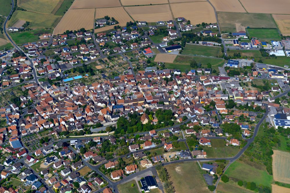 Neubrunn from the bird's eye view: City view from the outskirts with adjacent agricultural fields in Neubrunn in the state Bavaria, Germany