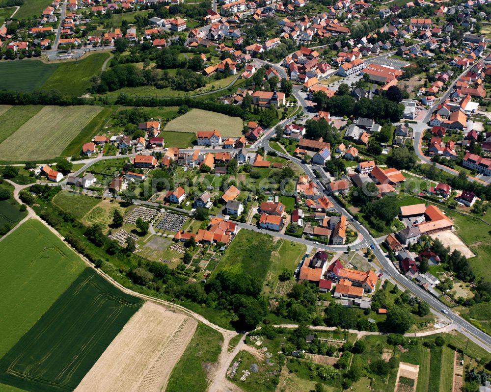 Teistungen from above - City view from the outskirts with adjacent agricultural fields in Teistungen in the state Thuringia, Germany