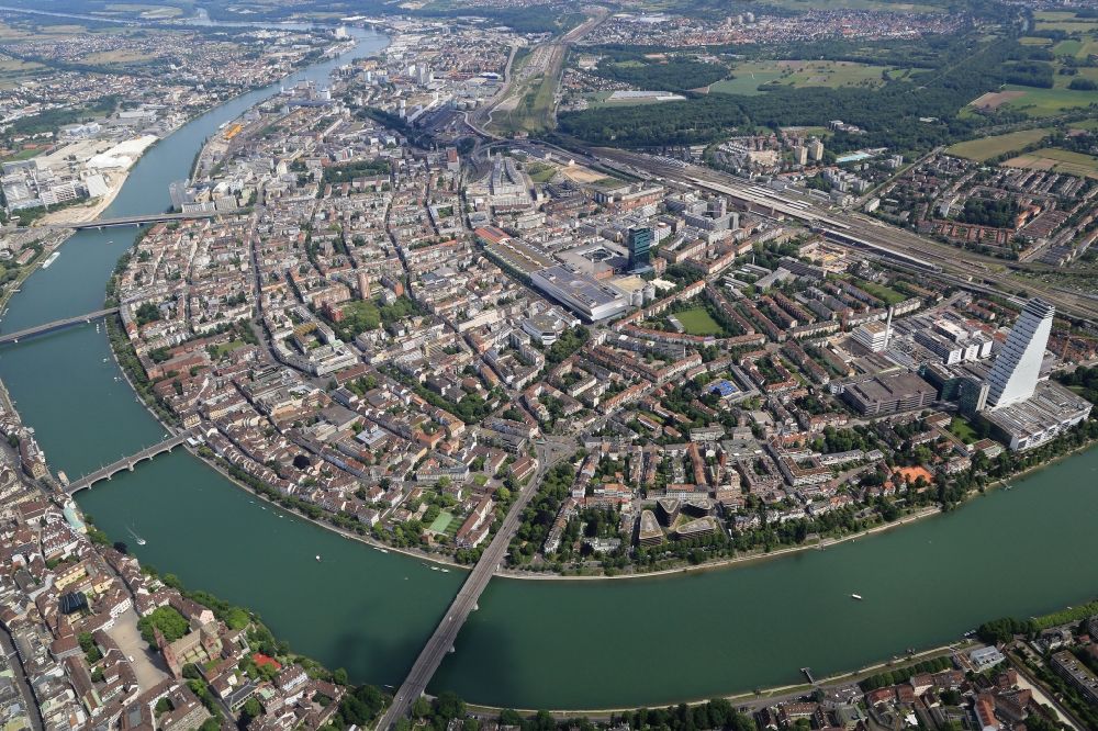 Aerial image Basel - On the right hand of the River Rhine is Kleinbasel, an urban area of Basel in Switzerland with the fair district and the new impressive Roche tower