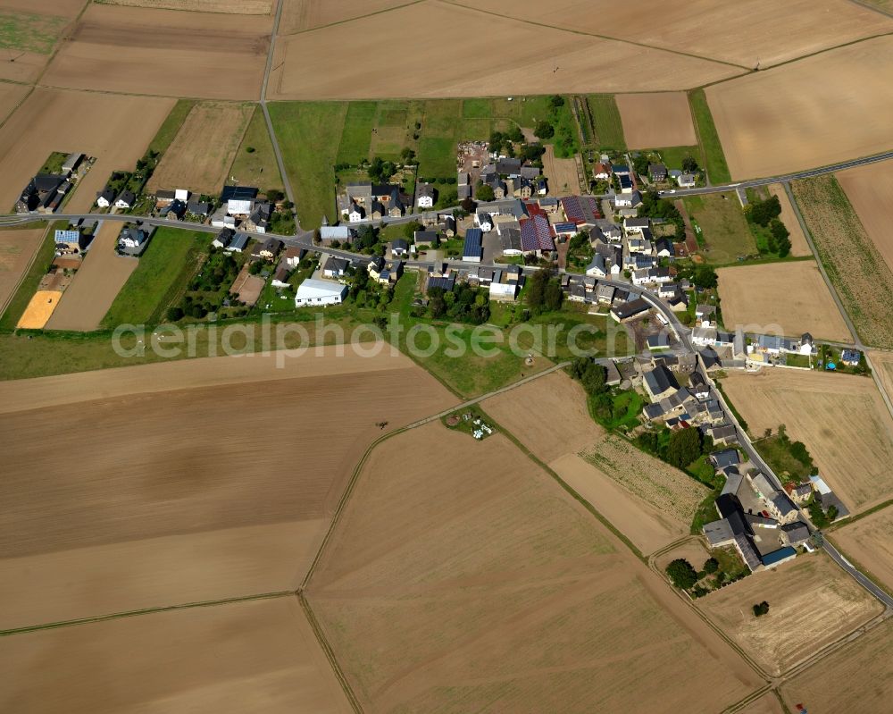 Polch from the bird's eye view: View of the Kaan part of the town of Polch in the state of Rhineland-Palatinate. Polch is located in the county district of Mayen-Koblenz in the South of the federal motorway A48. Kaan is surrounded by agricultural land and meadows and is one of three town parts