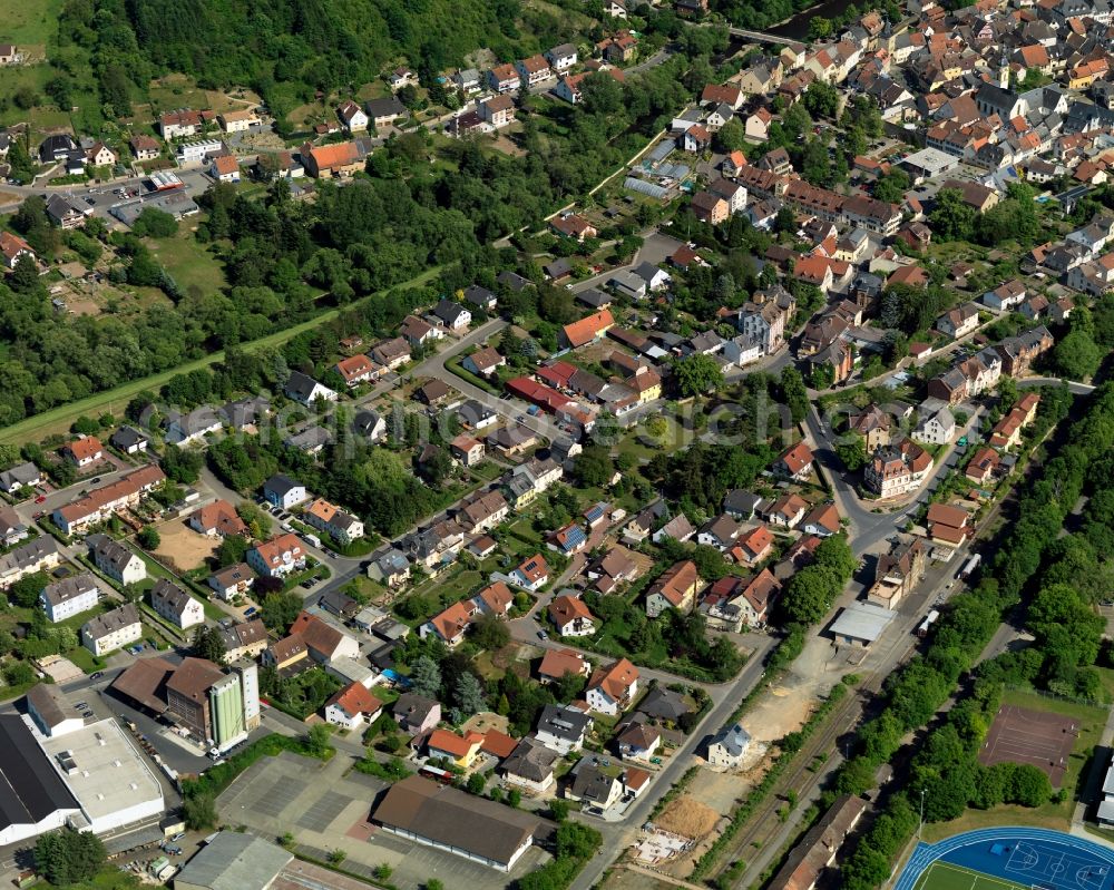 Aerial image Meisenheim - Partial view of Meisenheim in the state of Rhineland-Palatinate. Meisenheim is a town and municipiality in the county district of Bad Kreuznach. It is an official spa and health resort. The town is located on the federal highway B420, in the valley of the river Glan near the North Palatinate Mountain region. The town centre is located on the left riverbank of the Glan