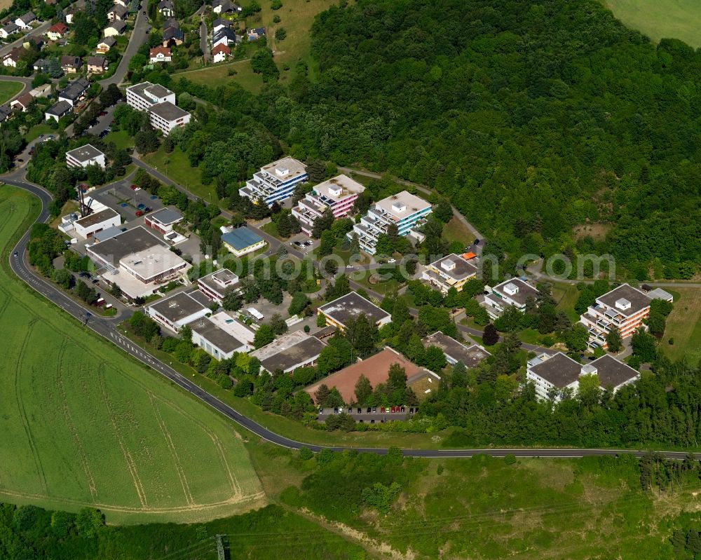 Aerial image Meisenheim - Partial view of Meisenheim in the state of Rhineland-Palatinate. Meisenheim is a town and municipiality in the county district of Bad Kreuznach. It is an official spa and health resort. The town is located on the federal highway B420, in the valley of the river Glan near the North Palatinate Mountain region