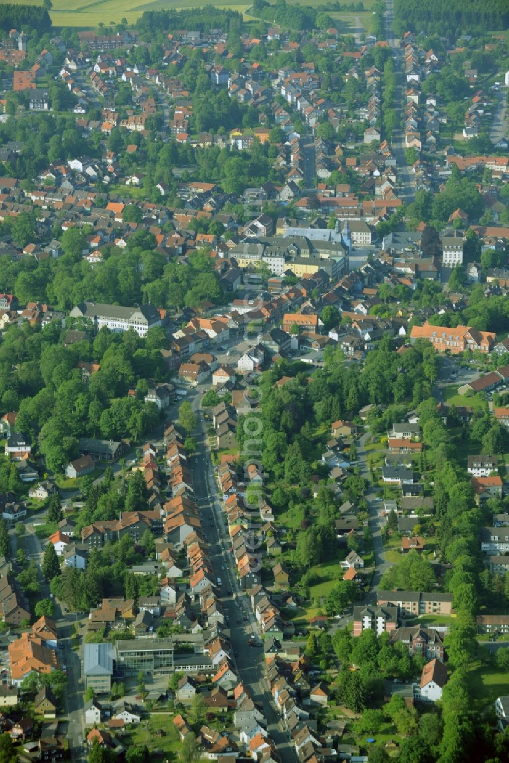 Clausthal-Zellerfeld from above - View of the Southwest of the town of Clausthal-Zellerfeld in the state of Lower Saxony. The mountain and university town is an official spa resort in the county district of Goslar. A residential area is located in its Southwest. View along Adolph-Roemer-Strasse where the church Marktkirche zum Heiligen Geist is located