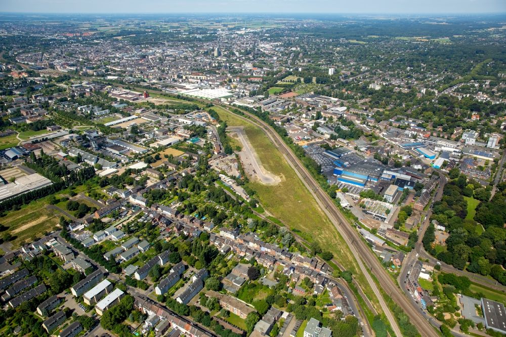Aerial image Krefeld - View of the West of Krefeld with industrial and commercial areas along railway tracks in the state of North Rhine-Westphalia